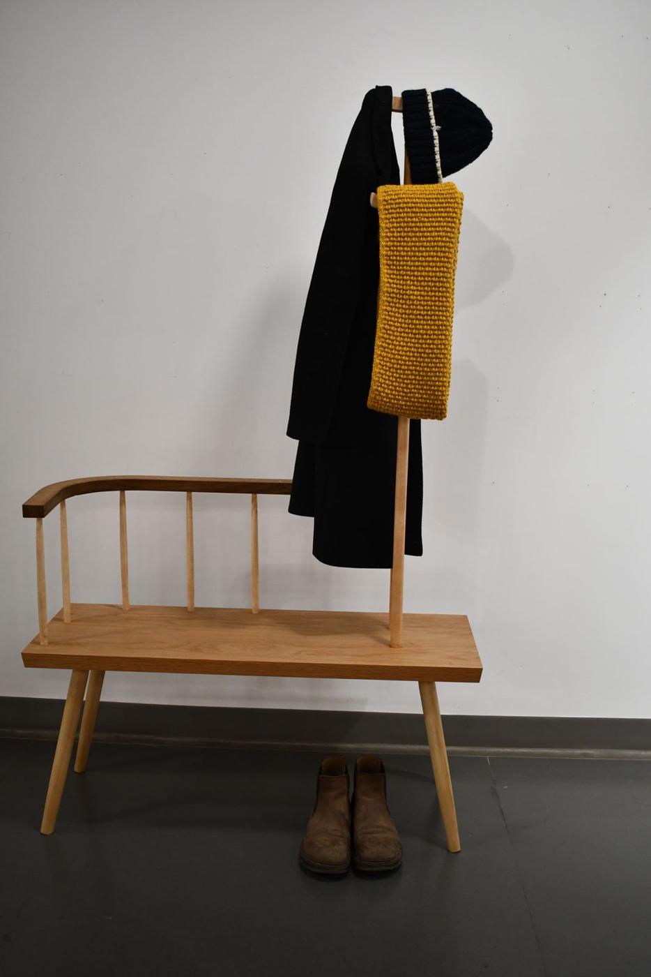Entry bench with coat and scarf