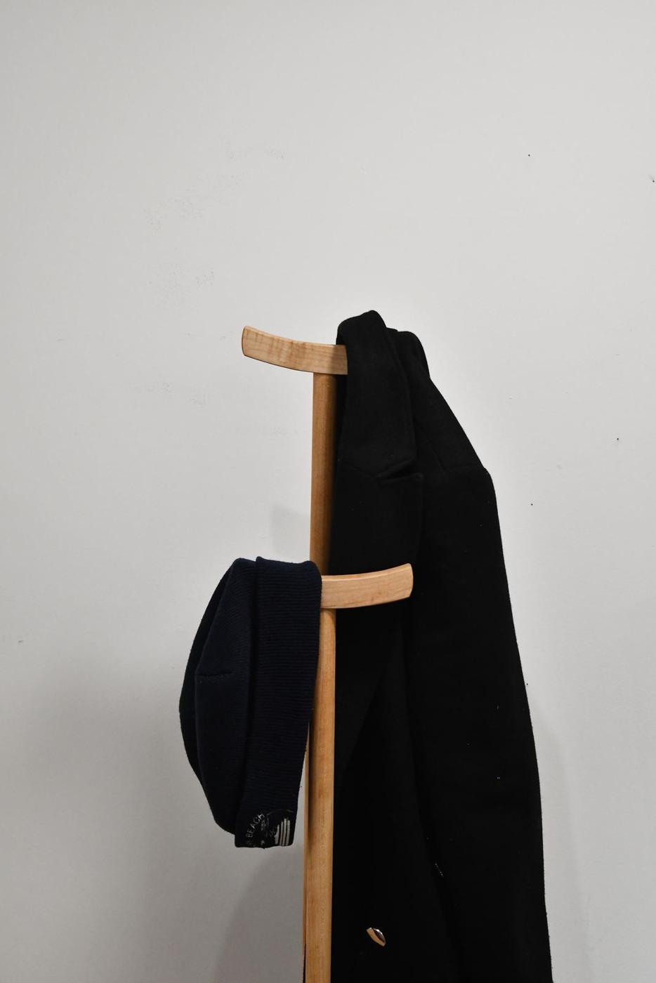 Coat hanging on the bench
